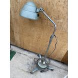 A RETRO INDUSTRIAL STYLE LIGHT ON WHEELED BASE