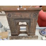 A VINTAGE CAST IRON FIRE PLACE WITH MANTLE PIECE