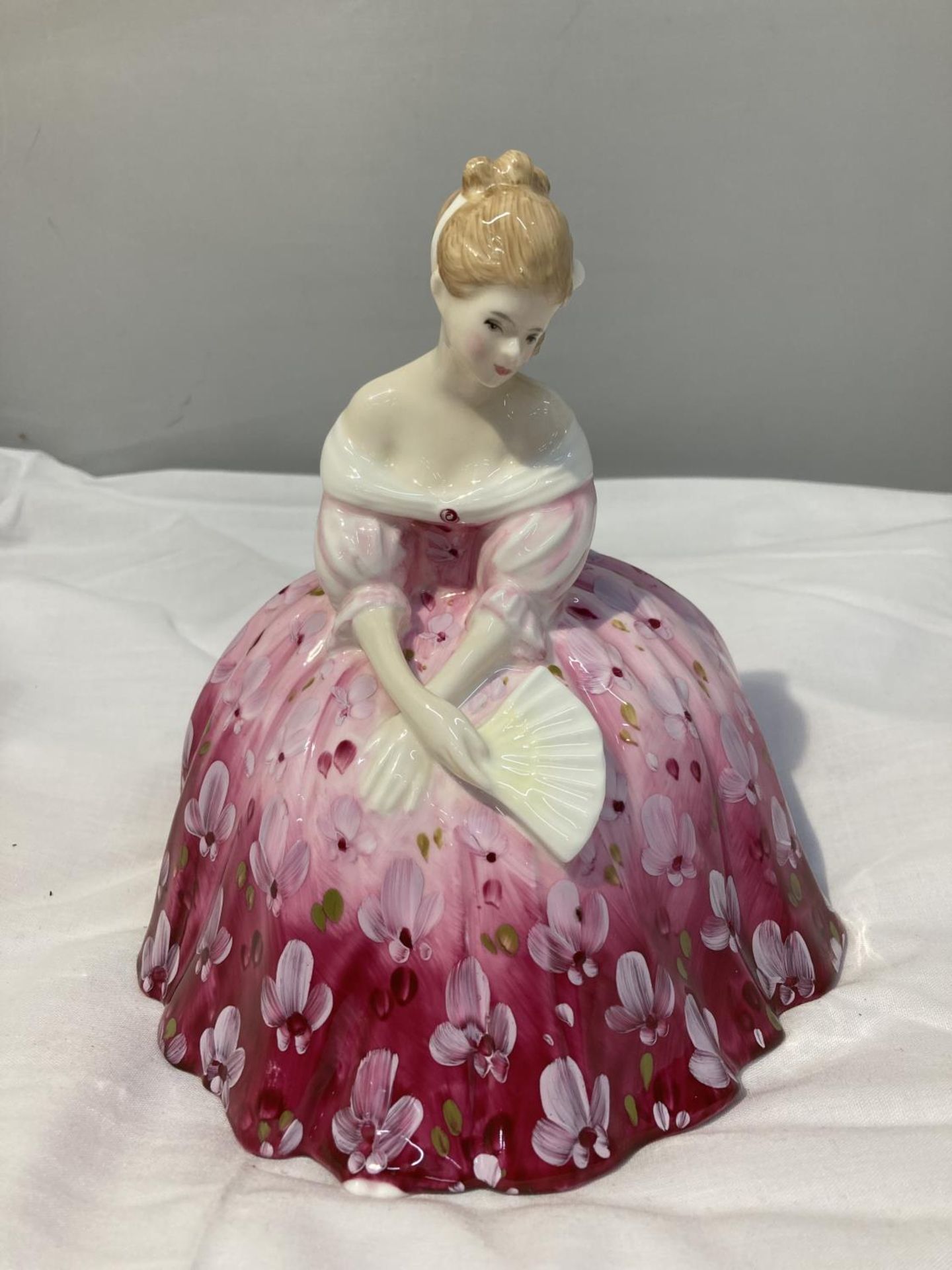 A ROYAL DOULTON FIGURE 'VICTORIA' HN2471