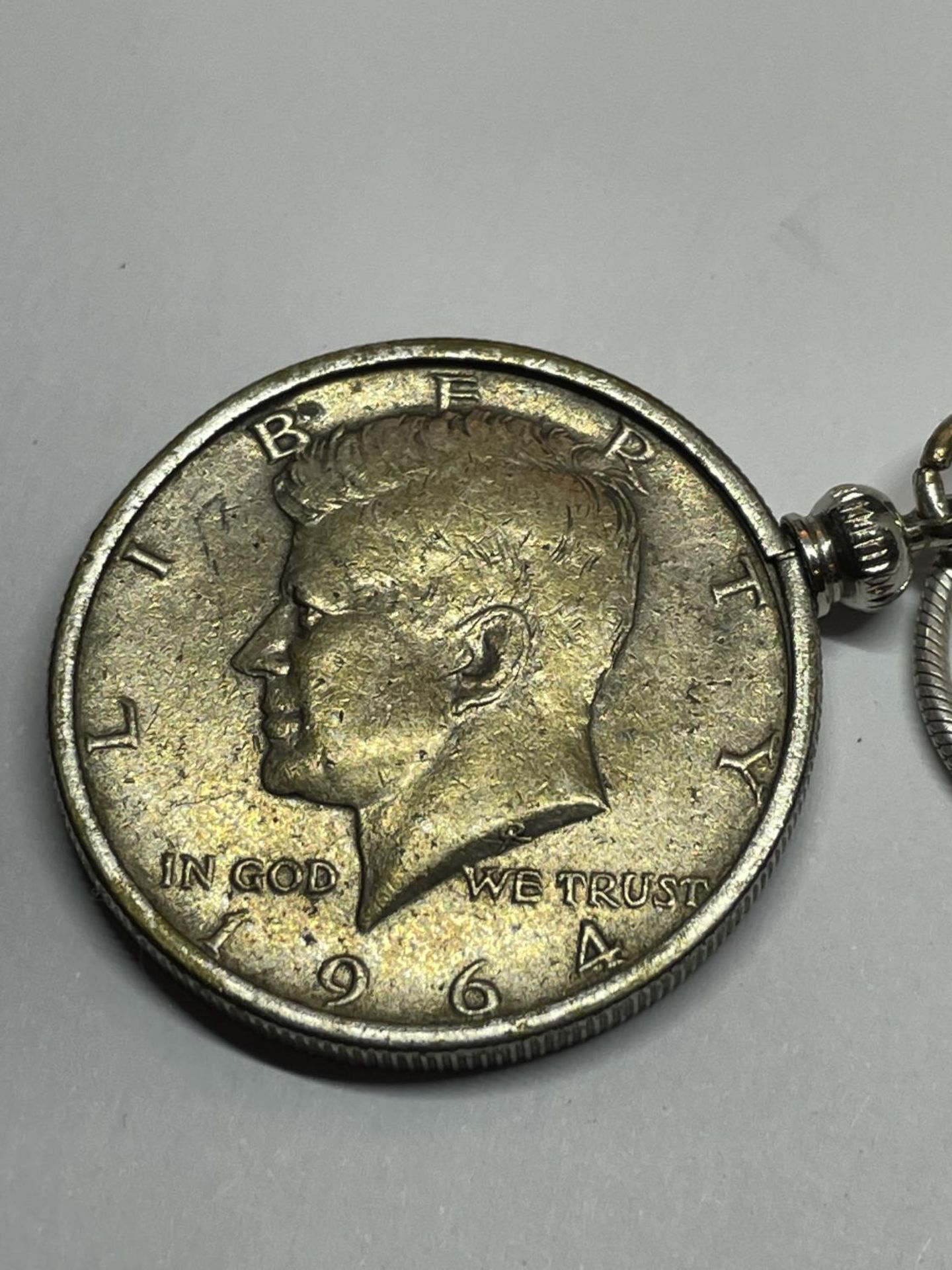 TWO MARKED SILVER CHAINS WITH PENDANTS TO INCLUDE A 1964 HALF DOLLAR AND A FURTHER MEDAL - Image 3 of 5