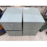 A PAIR OF TWO DRAWER METAL FILING CABINETS