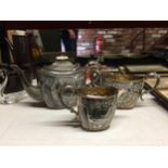 A THREE PIECE SILVER PLATED TEA SET COMPRISING OF A TEAPOT, CREAM JUG AND SUGAR BOWL