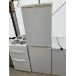 A WHITE UPRIGHT BEKO FRIDGE FREEZER