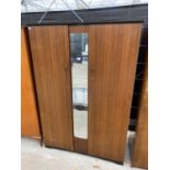 AN ADVANCE FURNITURE TWO DOOR MIRRORED WARDROBE 49" WIDE