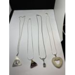 FOUR MARKED SILVER NECKLACES WITH PENDANTS TO INCLUDE A HEART DESIGN, TRIANGULAR STONE ETC