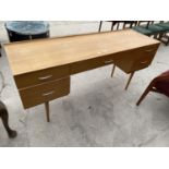 A 1970'S KNEE-HOLE DRESSING TABLE 60" WIDE