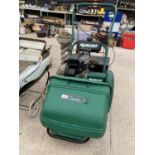 A QUALCAST CLASSIC PETROL 35S LAWN MOWER WITH GRASS BOX