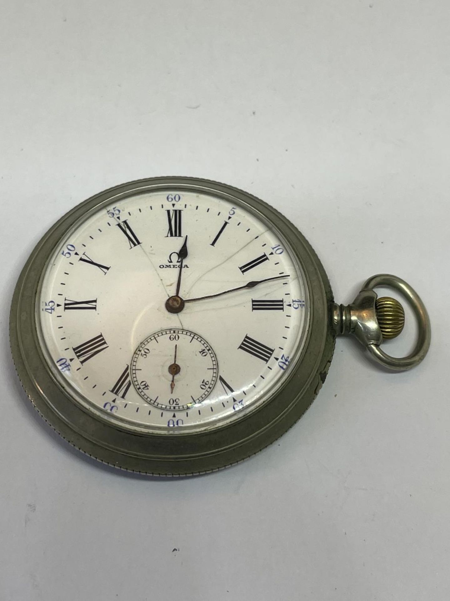 AN OMEGA POCKET WATCH SEEN WORKING BUT NO WARRANTY