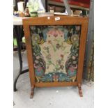 AN OAK FRAMED TAPESTRY FIRE SCREEN 75CM X 54CM