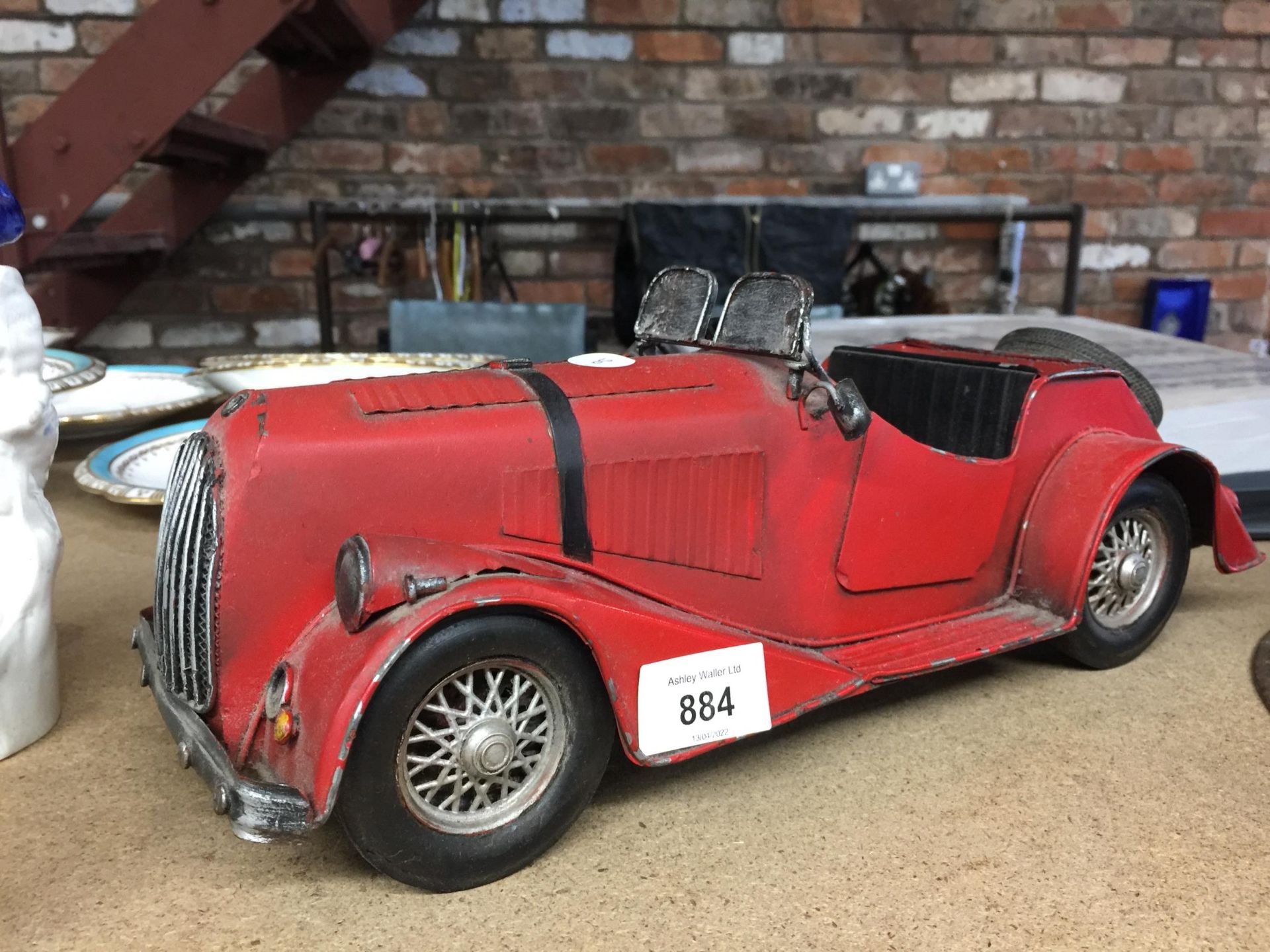 A LARGE MODEL OF A RED MORGAN SPORTS CAR LENGTH 36CM