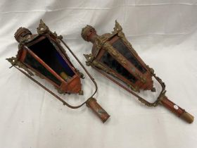 A PAIR OF VINTAGE ORNATE PARADE/MARCHING LANTERNS ONE WITH A GLASS A/F