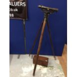 A THEODOLITE AND STAND