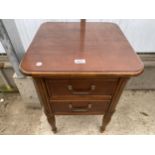 A LAURA ASHLEY 'HOME' BEDSIDE TABLE ENCLOSING TWO DRAWERS