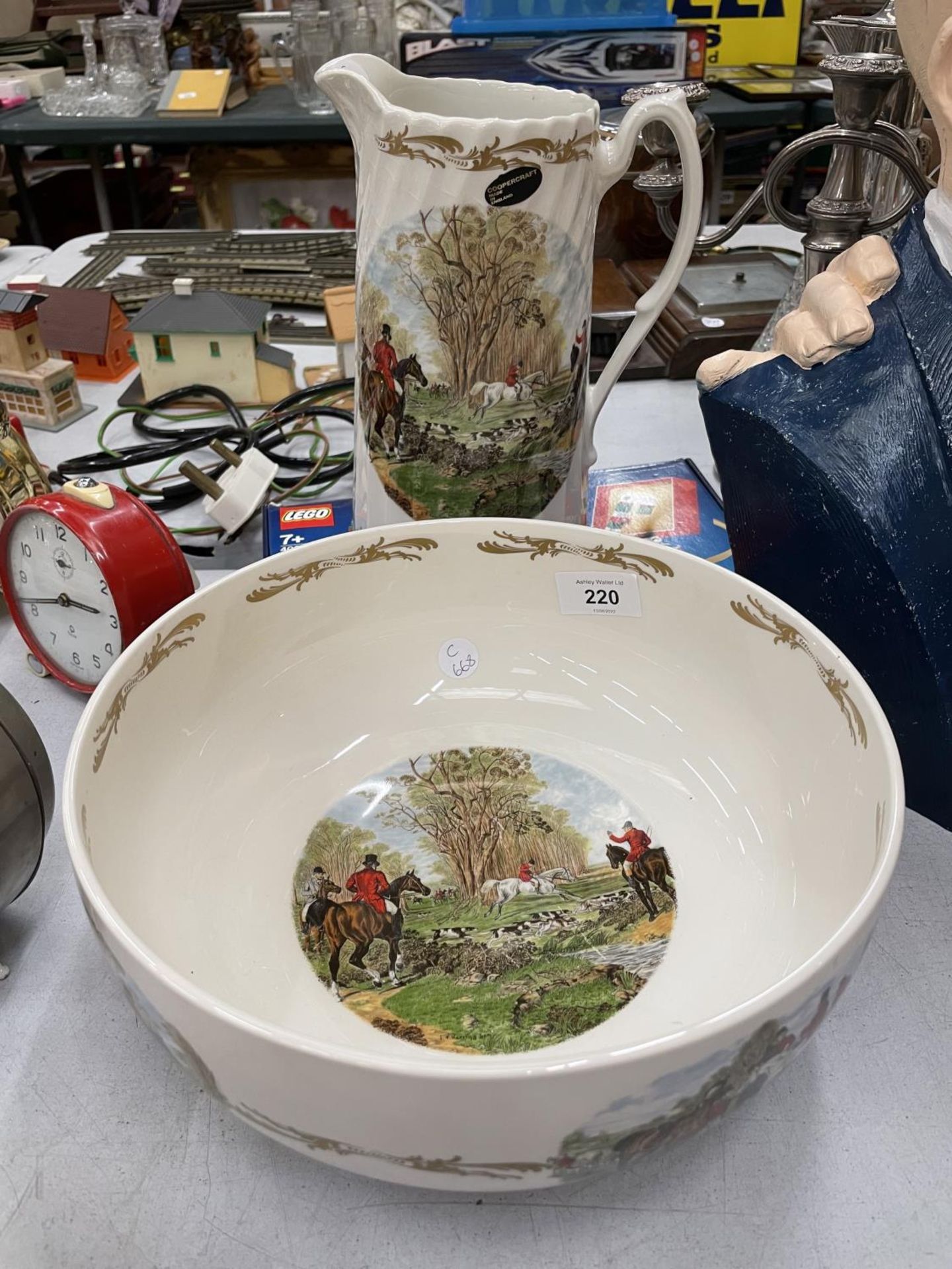 A LARGE COOPERCRAFT JUG AND BOWL WITH HUNTING SCENES