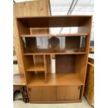 A RETRO TEAK LOUNGE UNIT WITH SLIDING SMOKED GLASS DOORS, 42" WIDE