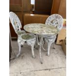 A VINTAGE CAST ALLOY BISTRO SET COMPRISING OF A ROUND TABLE AND TWO CHAIRS