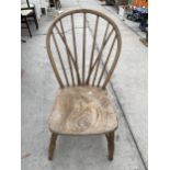 A CHILDS ELM AND BEECH WINDSOR STYLE CHAIR