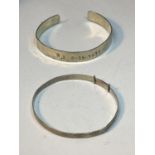TWO SILVER BANGLES ONE ENGRAVED