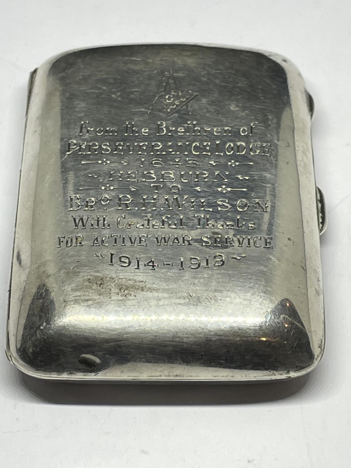 A HALLMARKED CHESTER CIGARETTE CASE WITH ENGRAVING RELATING TO A MASONIC LODGE MEMBER AND THEIR