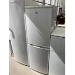 A WHITE ZANUSSI UPRIGHT FRIDGE FREEZER