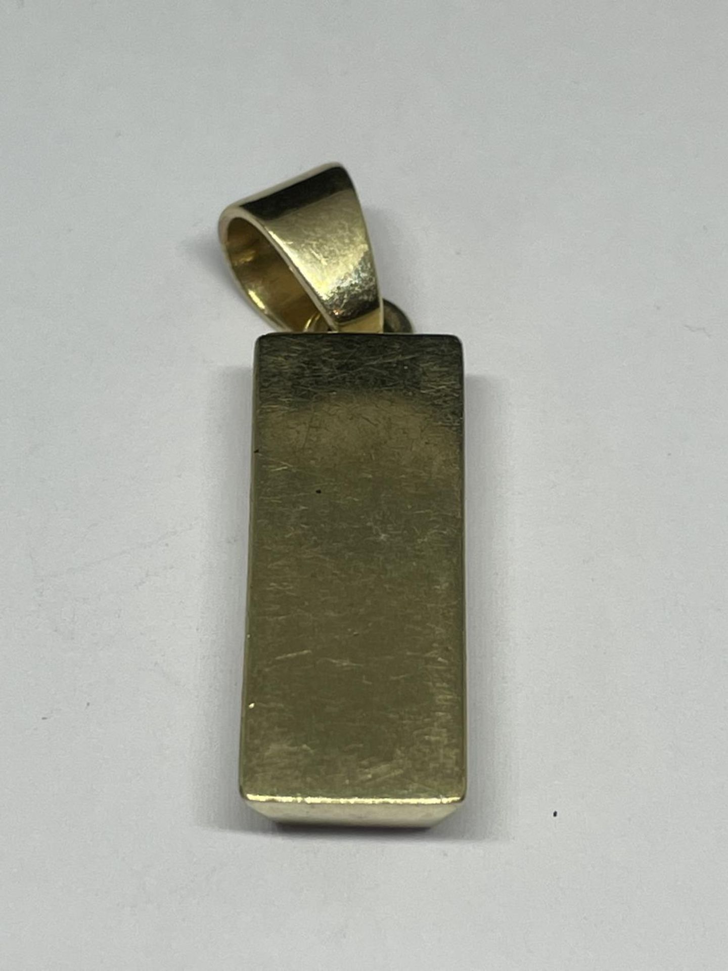 A 9 CARAT GOLD INGOT MARKED 375 GROSS WEIGHT 14.6 GRAMS - Image 2 of 3