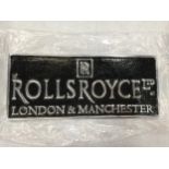 A CHROME AND BLACK RR LONDON & MANCHESTER SIGN 24.5CM X 10.5CM