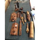 A QUANTITY OF TREEN ITEMS TO INCLUDE AFRICAN MASKS, FIGURES, BOX, COASTERS, ETC