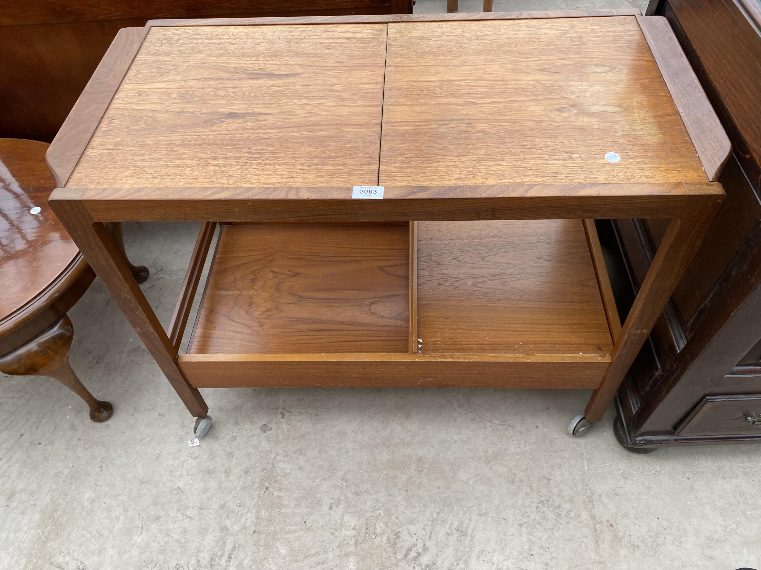 A RETRO TEAK REMPLOY TWO TIER TROLLEY WITH SINGLE DRAWER AND PULL-OUT TOP SECTION, 35X18"
