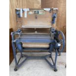 A VINTAGE CAST IRON EWBANK MANGLE IN WORKING CONDITION