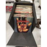 A BLACK 1970'S RECORD CASE CONTAINING ROCK AND POP SINGLES TO INCLUDE ART GARFUNKLE, LULU, WHAM,