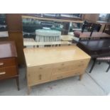 A MID 20TH CENTURY REMPLOY DRESSING TABLE ENCLOSING THREE DRAWERS AND ONE CUPBOARD, 43" WIDE