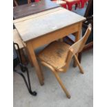 A MID 20TH CENTURY CHILDS DESK AND CHAIR