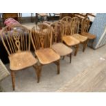 A SET OF SIX ELM REPRODUCTION WHEELBACK WINDSOR CHAIRS