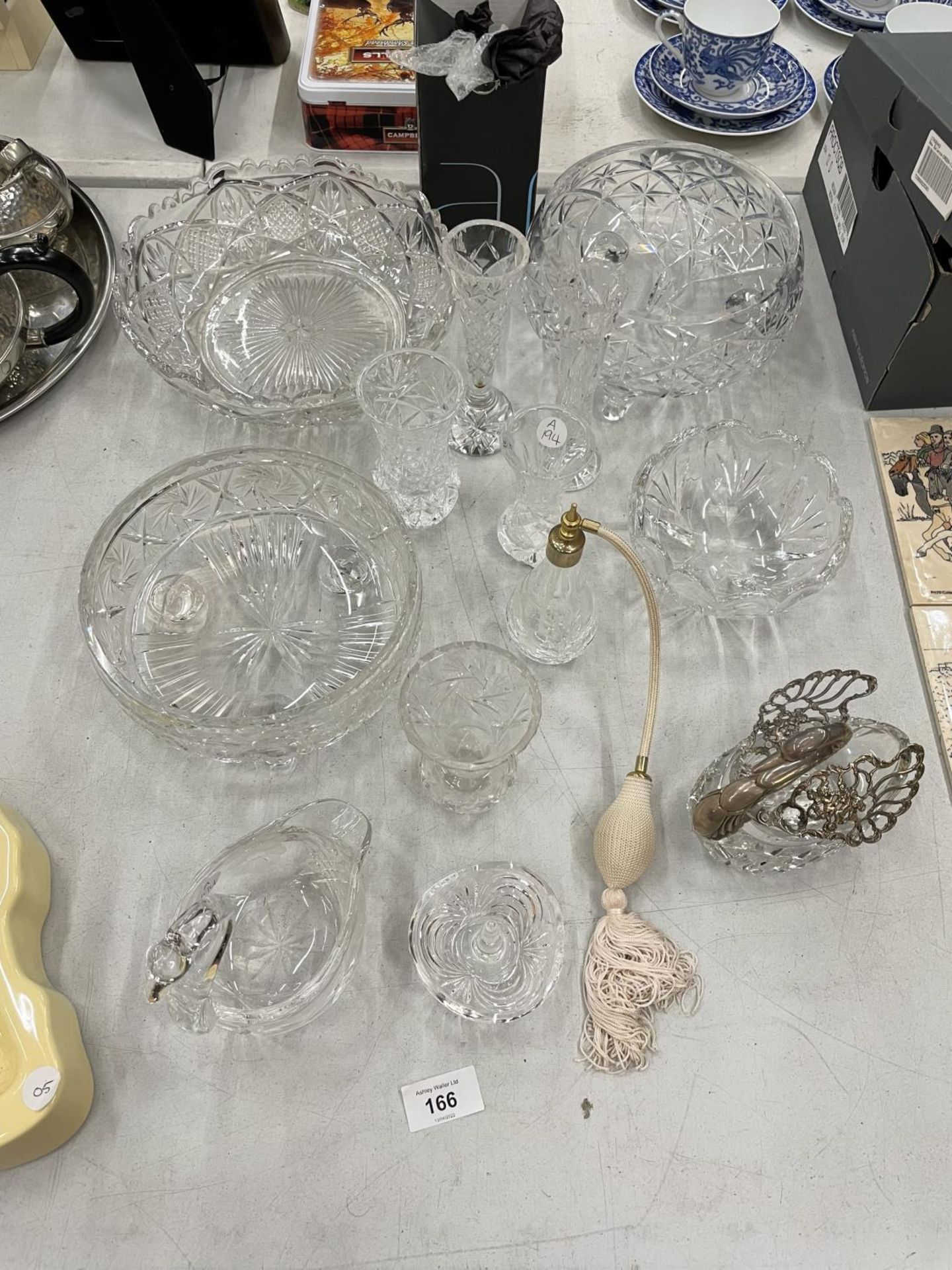 A QUANTITY OF CUT GLASS ITEMS TO INCLUDE SWAN DISHES, BOWLS, SCENT BOTTLE, VASES, ETC