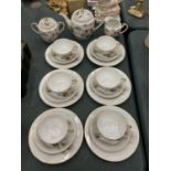 A QUANTITY OF JAPANESE TRIOS PLUS A TEAPOT, SUGAR BOWL AND CREAM JUG MARKED TO THE BASE. THE CUPS