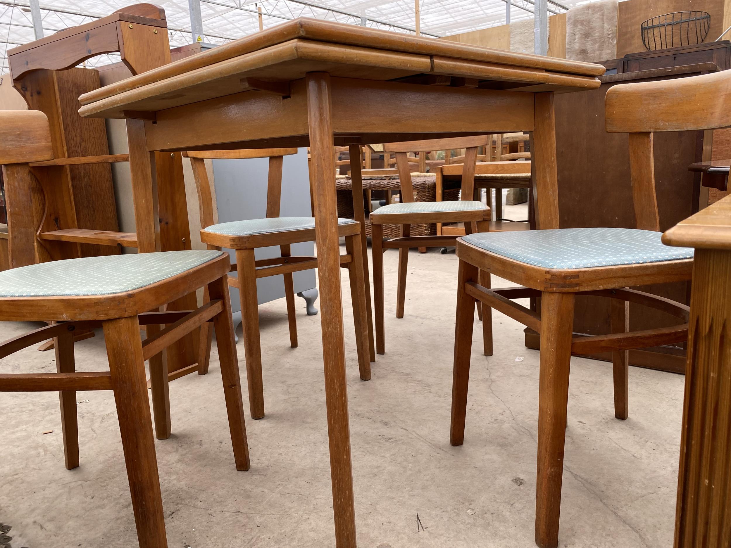 A 1950'S FORMICA TOP DRAW-LEAF KITCHEN TABLE AND FOUR CHAIRS - Image 3 of 8