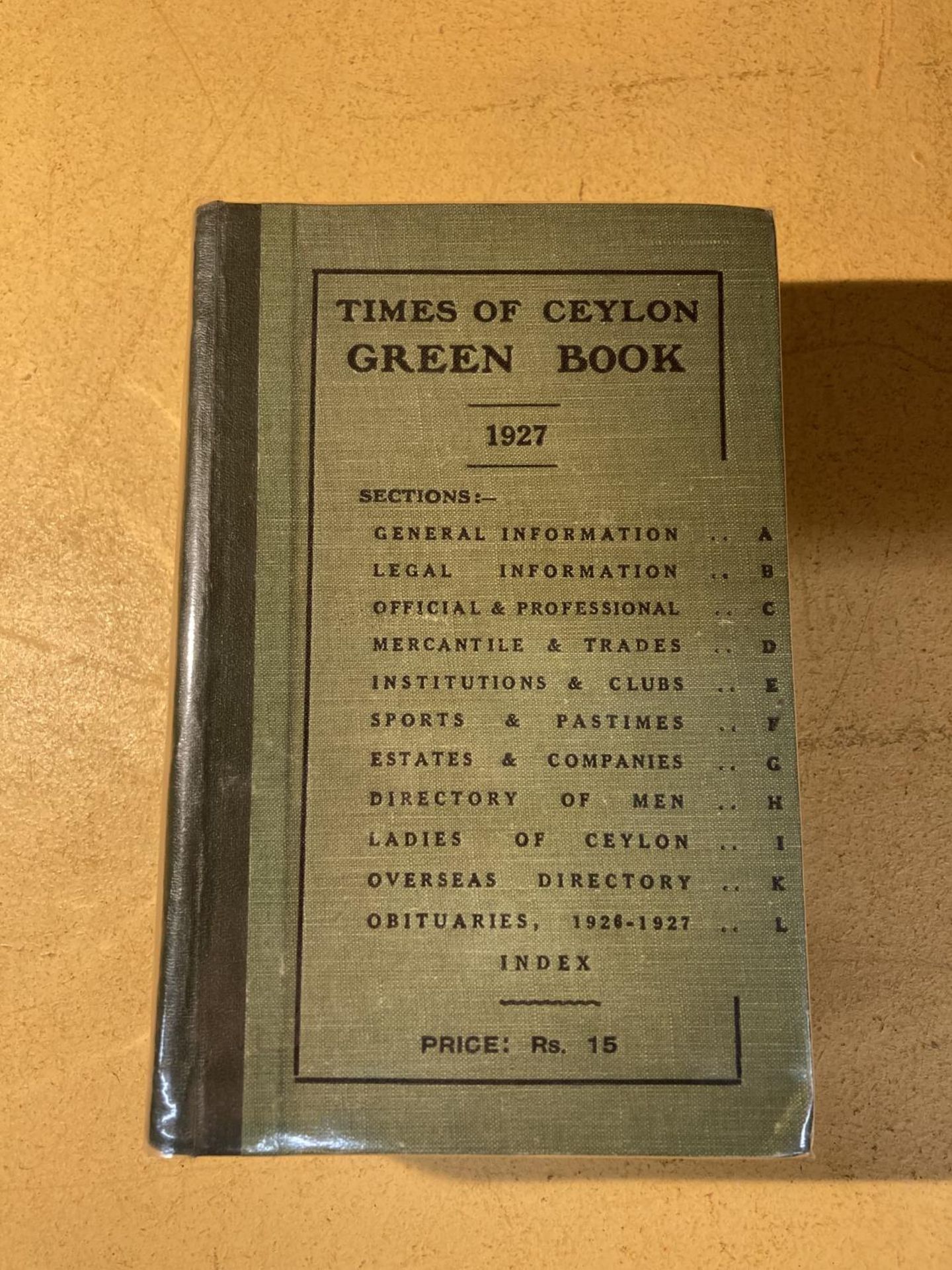 A TIMES OF CEYLON GREEN BOOK 1927 IN A PROTECTIVE CLEAR WRAPPER, PUBLISHED BY BLACKFRIAR HOUSE
