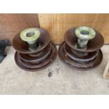 A PAIR OF GARDEN WATER FEATURES FORMED FROM CERAMIC ELECTRICITY RESISTORS