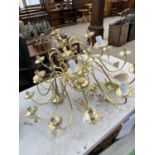 A LARGE GILT CHANDELIER STYLE LIGHT FITTING