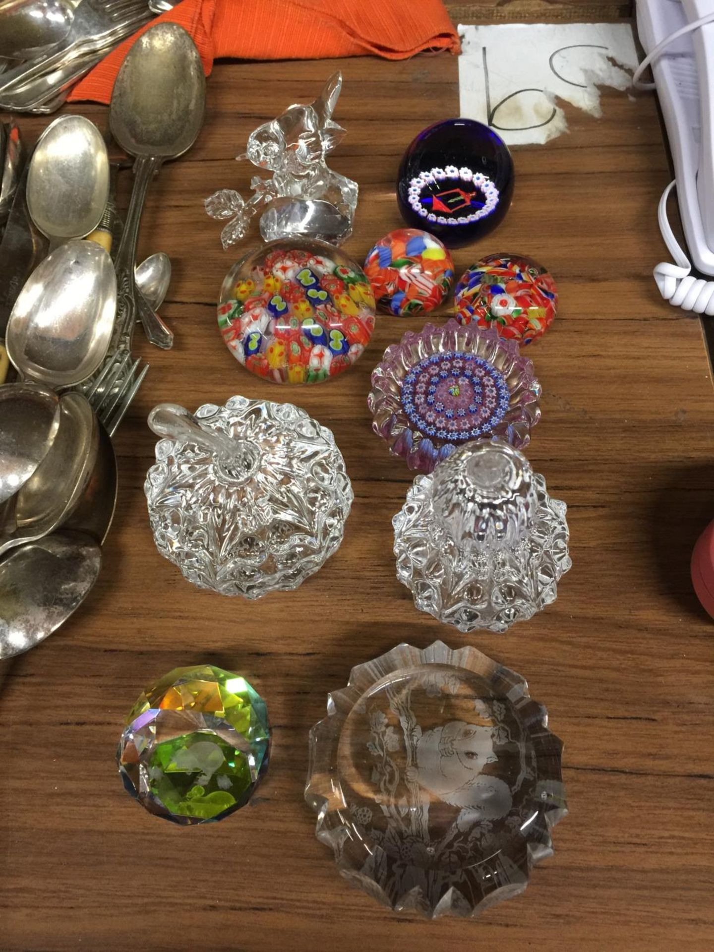 A QUANTITY OF GLASS PAPERWEIGHTS INCLUDING MILLEFIORI STYLE, FRUIT SHAPES, ETC