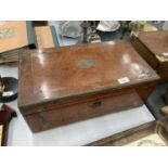 A BURR WALNUT WRITING SLOPE WITH INLAID BRASS DECORATION IN NEED OF RESTORATION