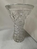 A VERY HEAVY CUT GLASS VASE HEIGHT 37CM