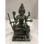 A POSSIBLY BRONZE STATUE OF AN ASIAN DEITY HEIGHT 25CM