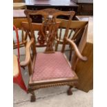 A MAHOGANY CHIPPENDALE STYLE ELBOW CHAIR