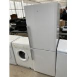 A WHITE BLOMBERG UPRIGHT FRIDGE FREEZER