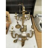 TWO DECORATIVE BRASS LIGHT FITTINGS AND A DECORATIVE LAMP BASE