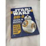 A STAR WARS BB-8 BOOK AND MODEL