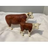 TWO BESWICK FIGURES, A HEREFORD COW AND A CALF