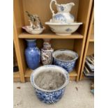 AN ASSORTMENT OF CERAMIC ITEMS TO INCLUDE A JUG AND WASH BOWL, STICK STANDS AND PLANTERS ETC