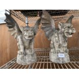 A PAIR OF RECONSTITUTED STONE GARGOYLES WINGS A/F